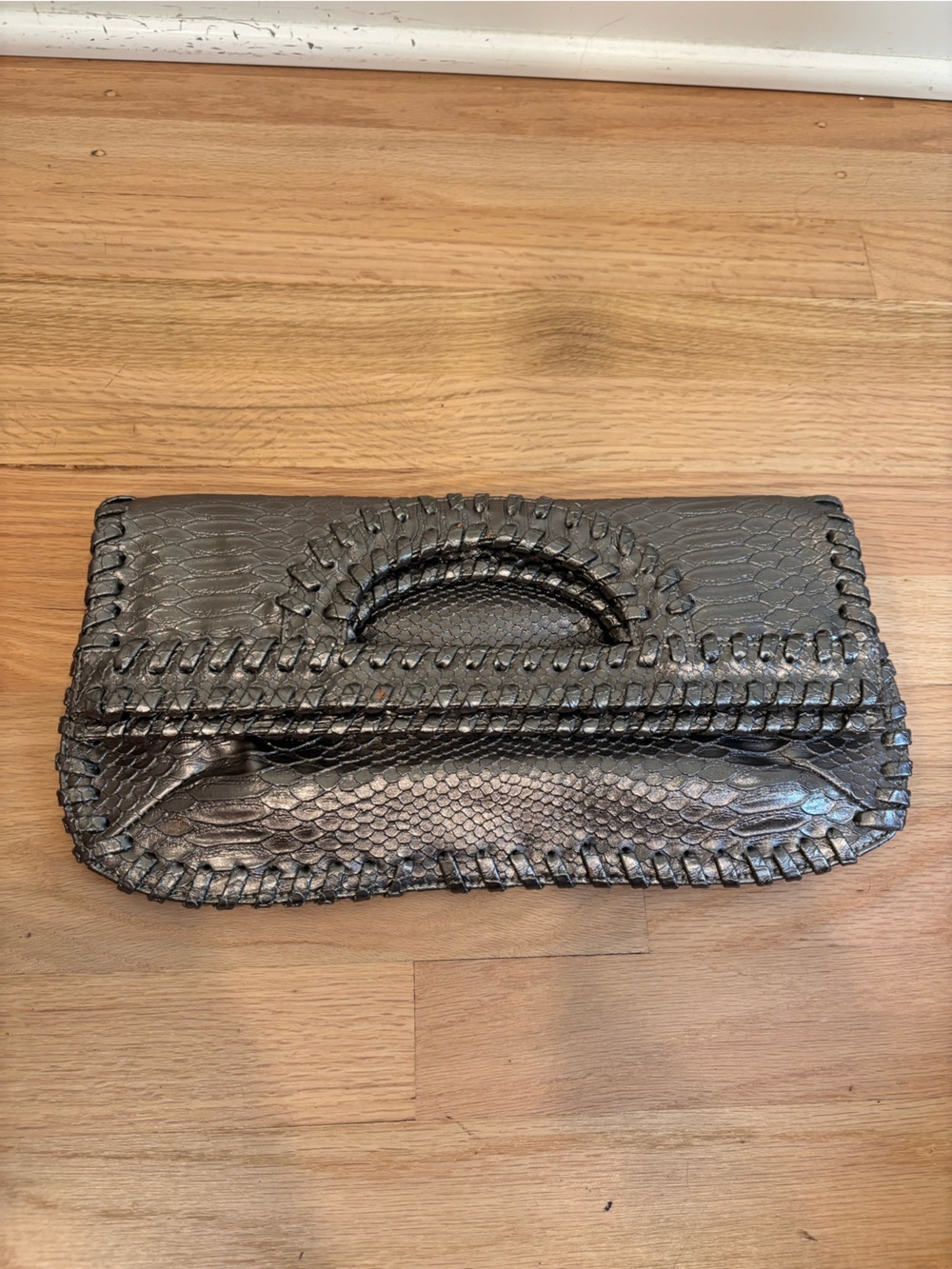 Big Buddha metallic silver snakeskin texture & whipstitch clutch